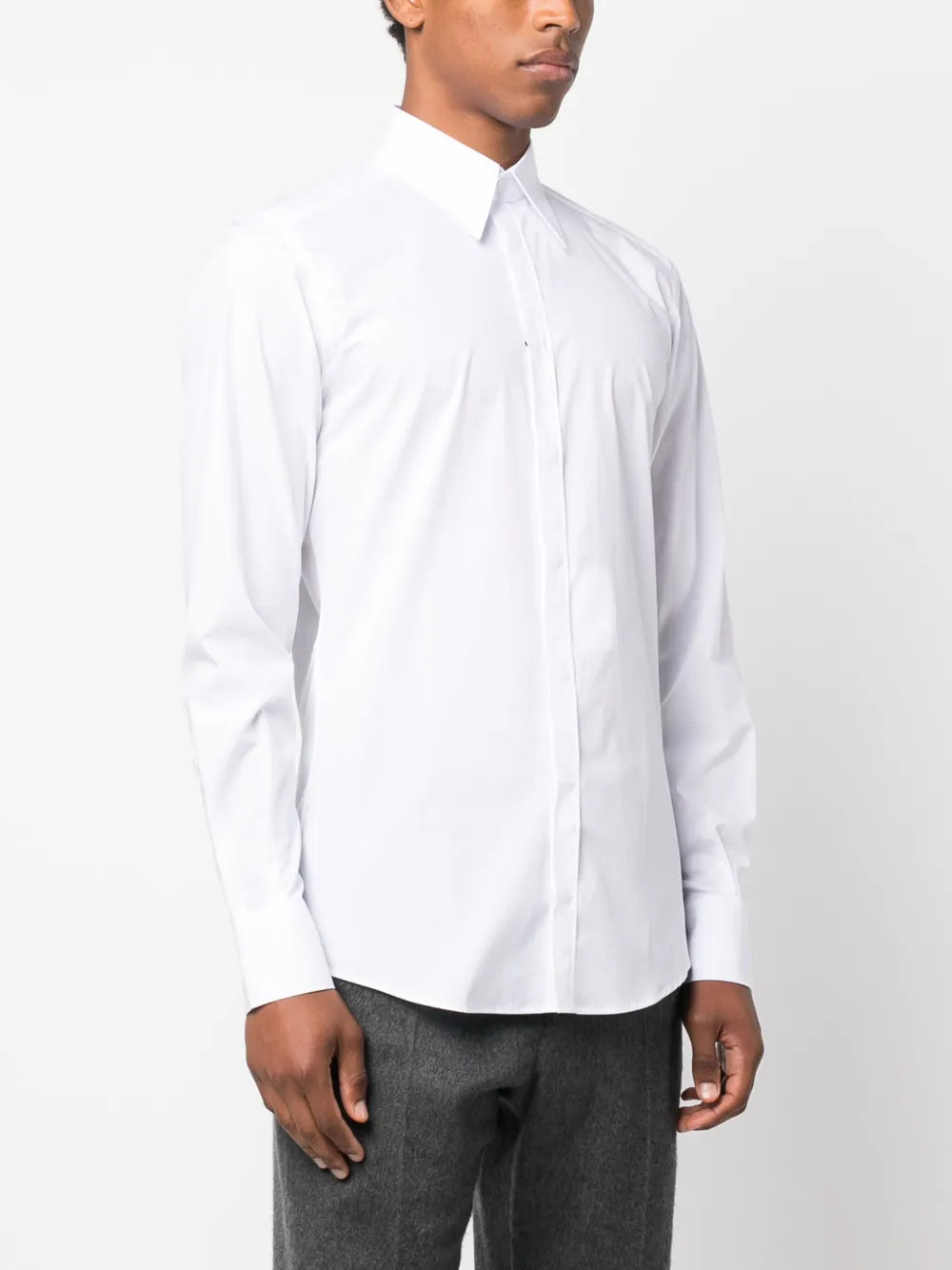 1. Dolce & Gabbana2. Classic white shirt3. Luxury menswear4. Elegant men's clothing5. Designer shirts