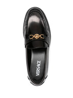 Versace moccasins, luxury women's footwear, Medusa emblem shoes, black leather moccasins, high-end women's shoes