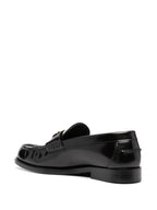 Versace moccasins, luxury women's footwear, Medusa emblem shoes, black leather moccasins, high-end women's shoes