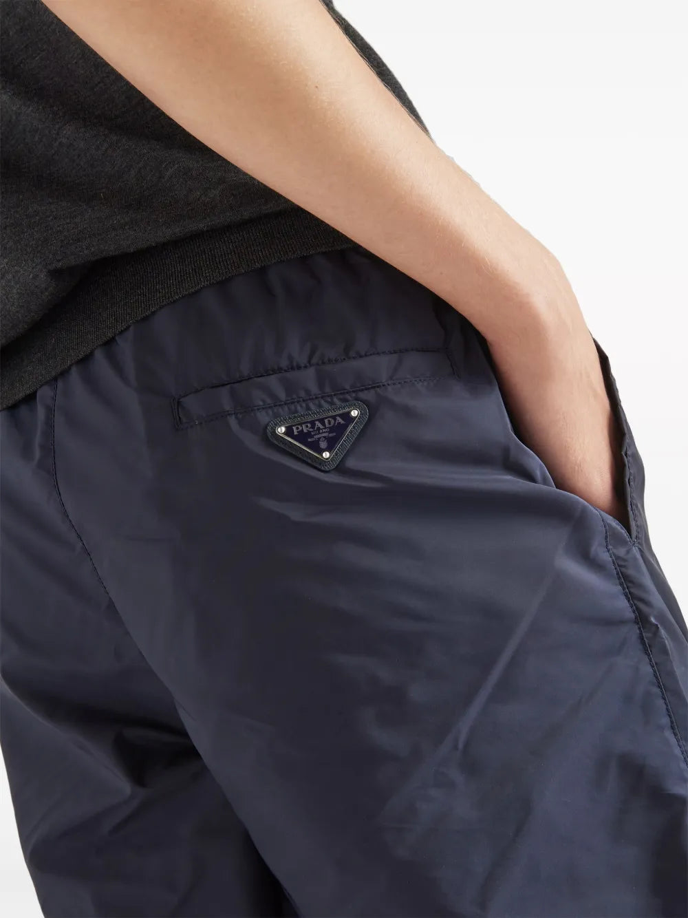 Prada swim shorts, luxury swimwear, men's black swim shorts, sustainable swimwear, Re-Nylon shorts