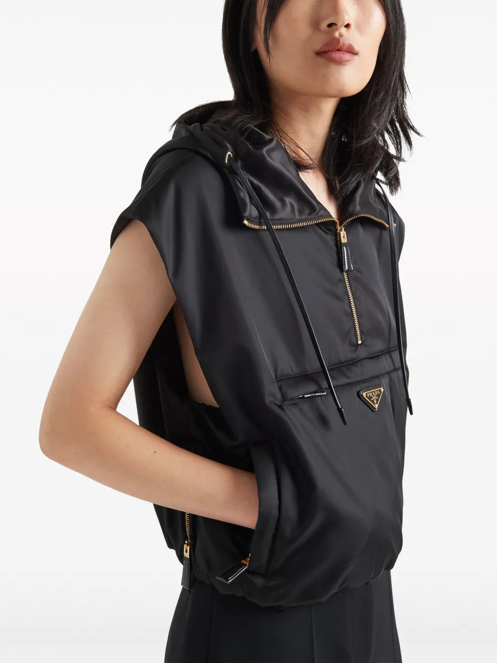 Image of Sleeveless Re-nylon Vest Black by Prada for Women - Season Spring-Summer 2025 - Model view 3
