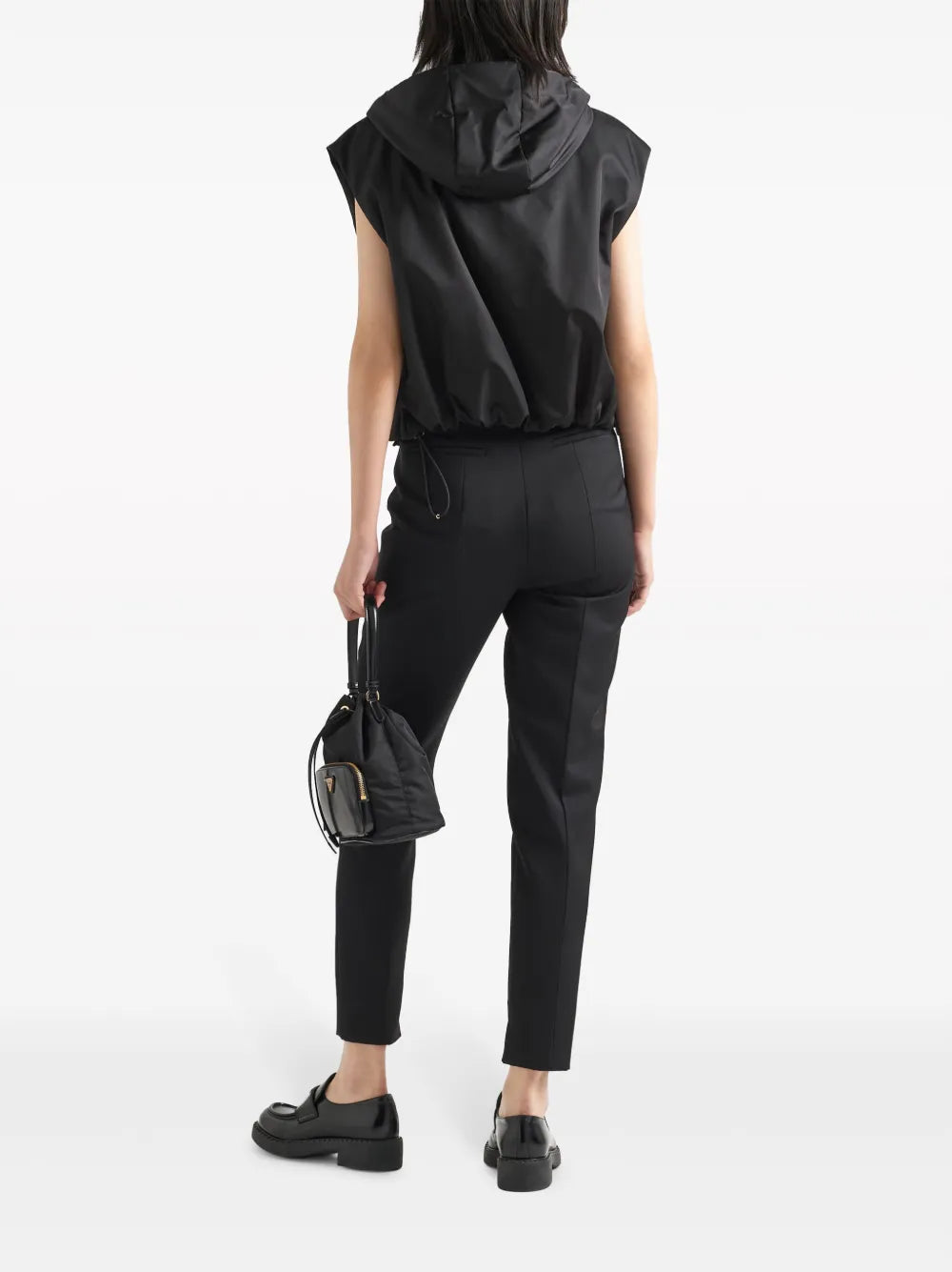 Image of Sleeveless Re-nylon Vest Black by Prada for Women - Season Spring-Summer 2025 - Model view 2