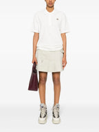 Immagine della polo bianca classica con logo di Moncler per donne - Stagione primavera-estate 2024 - Vista posteriore
