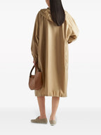 Prada parka, Re-Nylon jacket, luxury outerwear, sustainable fashion, high-end beige coat