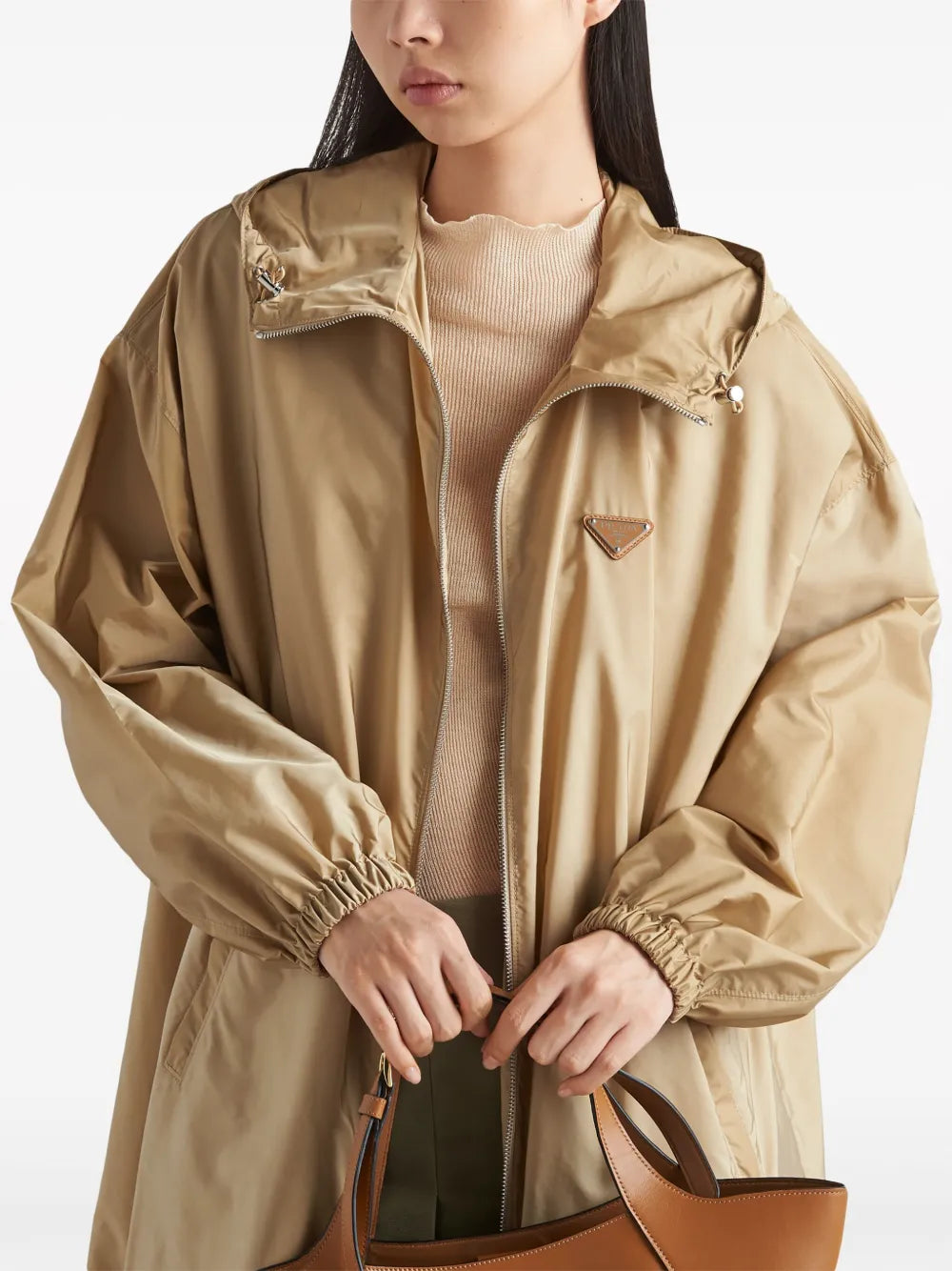 Prada parka, Re-Nylon jacket, luxury outerwear, sustainable fashion, high-end beige coat