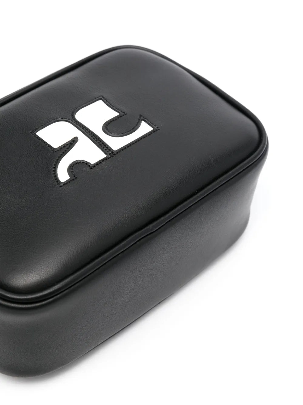 camera bag, Courrèges, luxury leather bag, minimalist design, high-end accessory