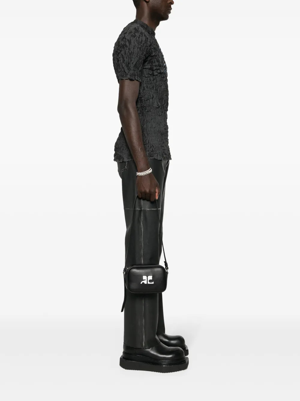 camera bag, Courrèges, luxury leather bag, minimalist design, high-end accessory