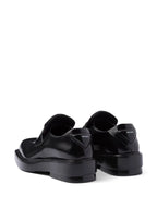 Prada mocassins, brushed leather shoes, luxury footwear, black leather mocassins, designer shoes