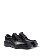 Prada mocassins, brushed leather shoes, luxury footwear, black leather mocassins, designer shoes