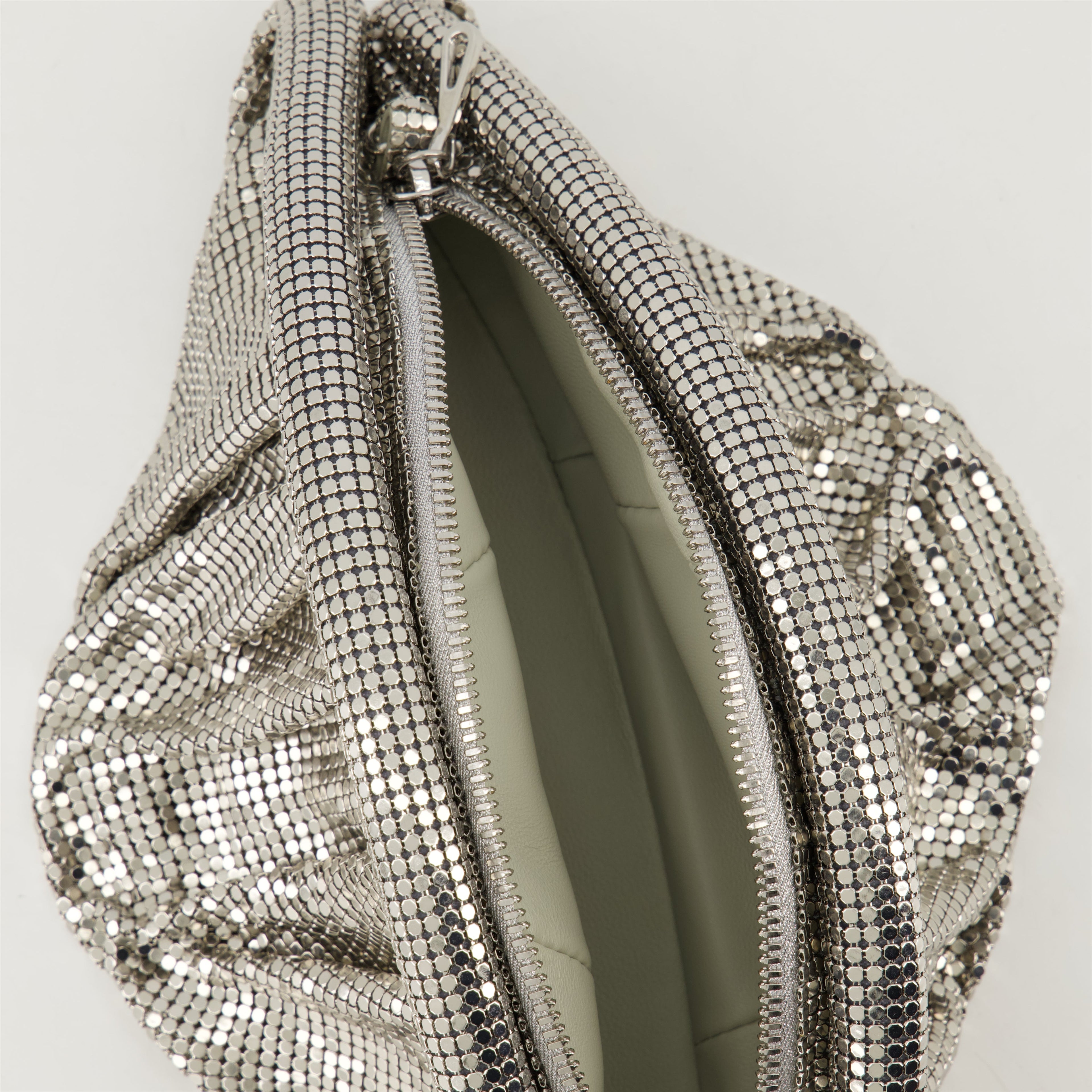 metallic clutch, Rabanne bag, silver mesh bag, trendy accessories, designer clutch