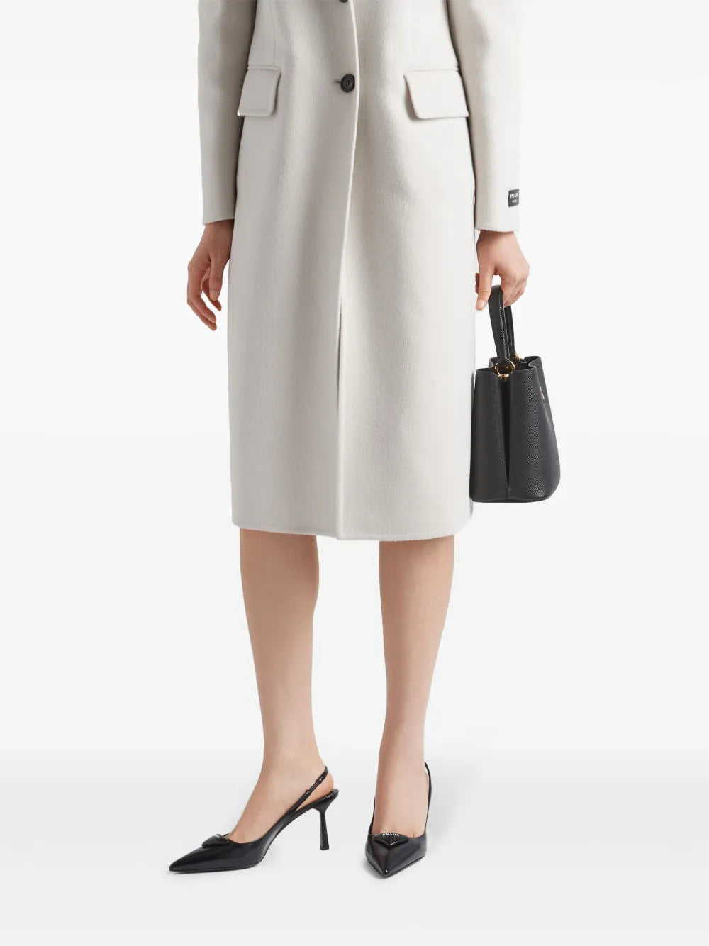 pointed toe pump, black leather shoe, Prada pump, elegant footwear, leather heel