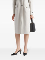 pointed toe pump, black leather shoe, Prada pump, elegant footwear, leather heel