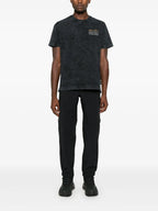 Image of Black Cargo Sport Pants by Moncler Grenoble for Men - Season Autumn-Winter 2024 - Back View