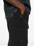 Image of Black Cargo Sport Pants by Moncler Grenoble for Men - Season Autumn-Winter 2024 - Detail View 7