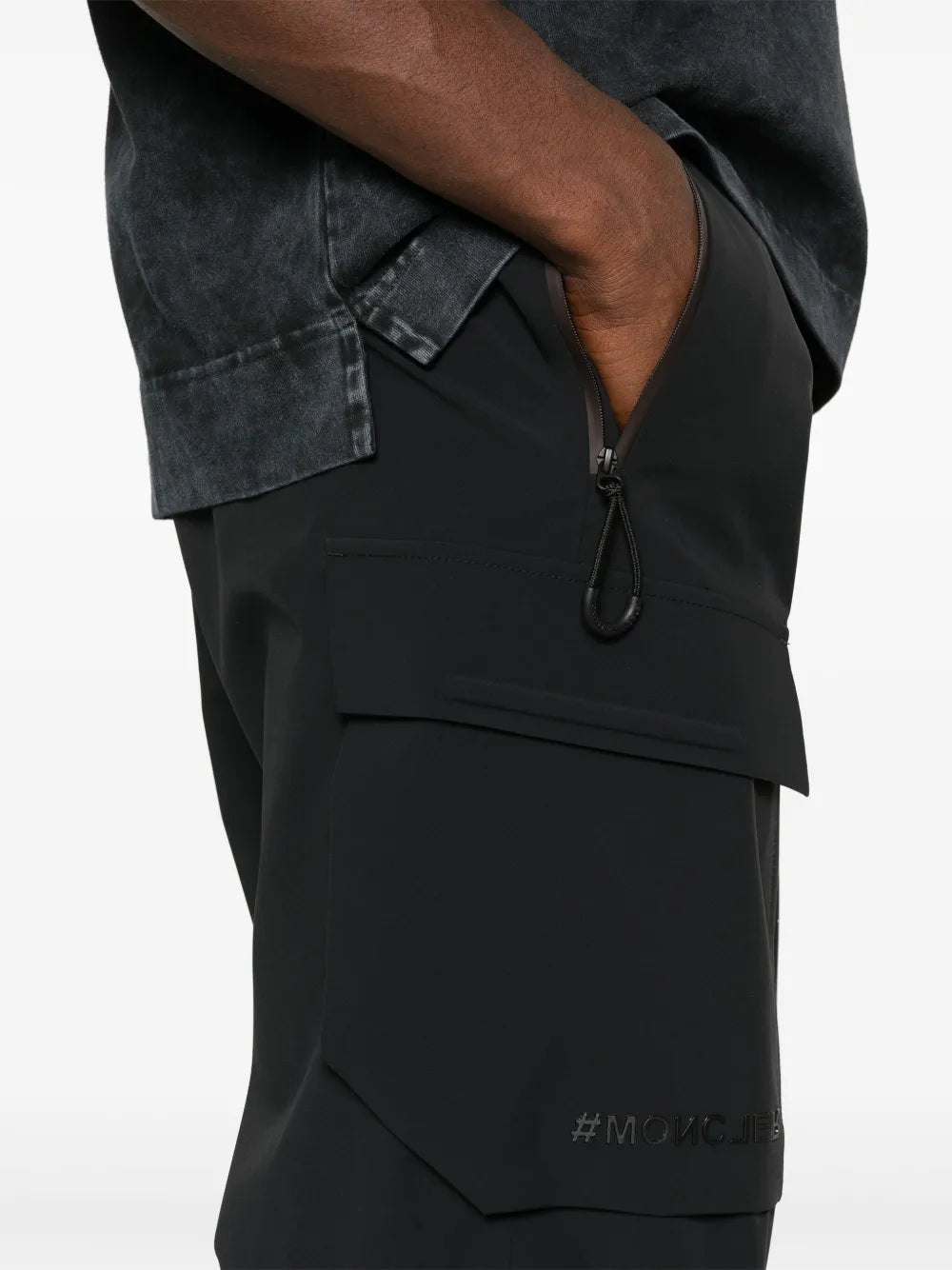 Image of Black Cargo Sport Pants by Moncler Grenoble for Men - Season Autumn-Winter 2024 - Detail View 7