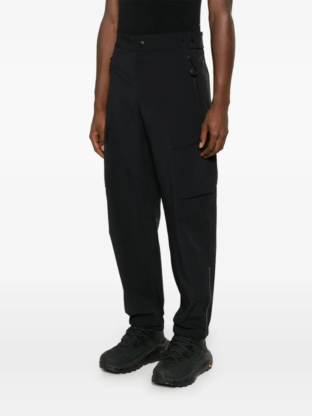 Image of Black Cargo Sport Pants by Moncler Grenoble for Men - Season Autumn-Winter 2024 - Detail View 1