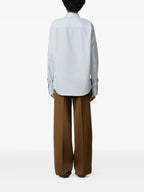 Image of Ami de Coeur Striped Shirt by Ami PARIS for Unisex - Season Autumn-Winter 2025 - Model view 4