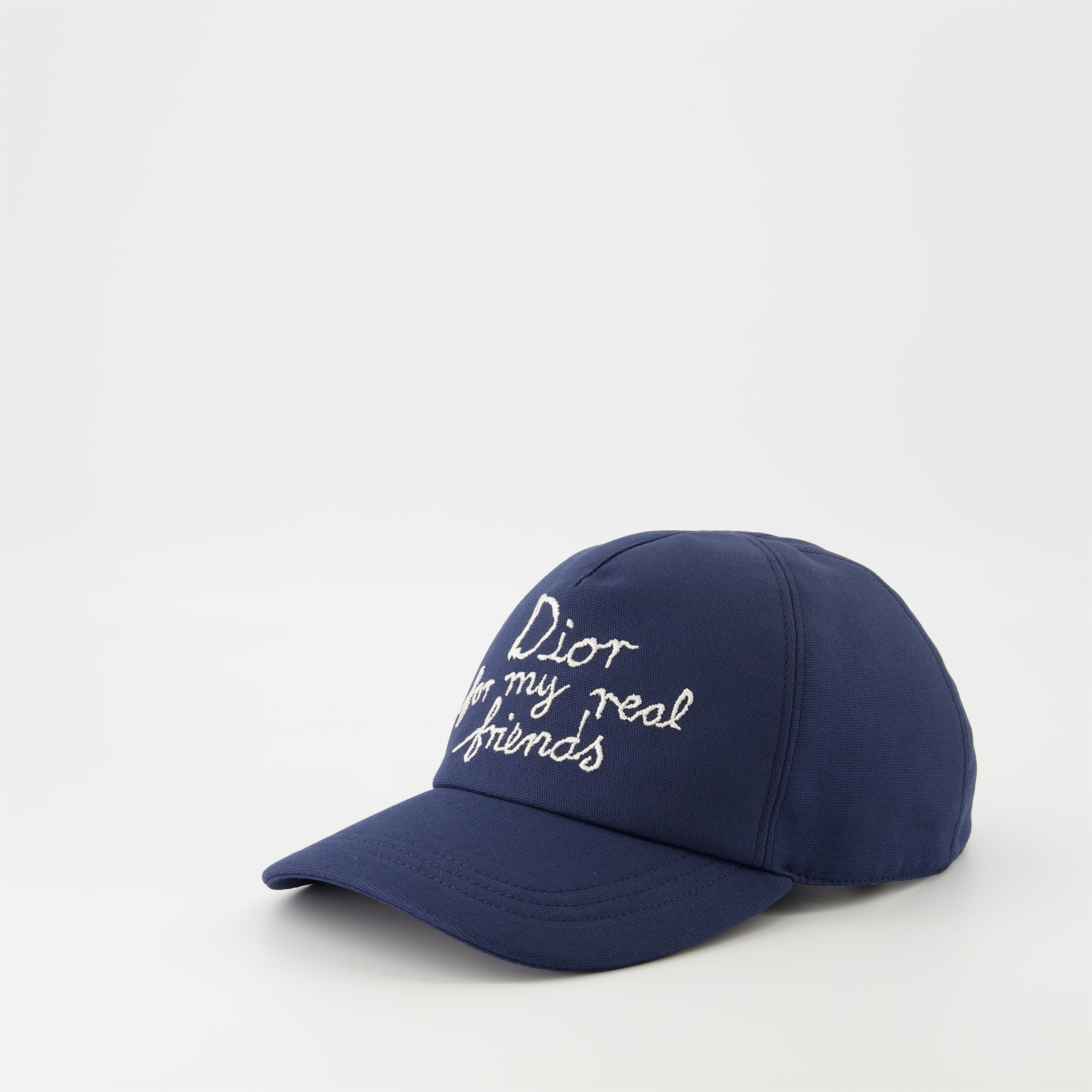 blue cap, Dior collaboration, embroidered logo, adjustable hat, cotton accessory