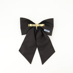 Prada barrette, Re-Nylon accessory, bow hair clip, sustainable fashion, black hair accessory