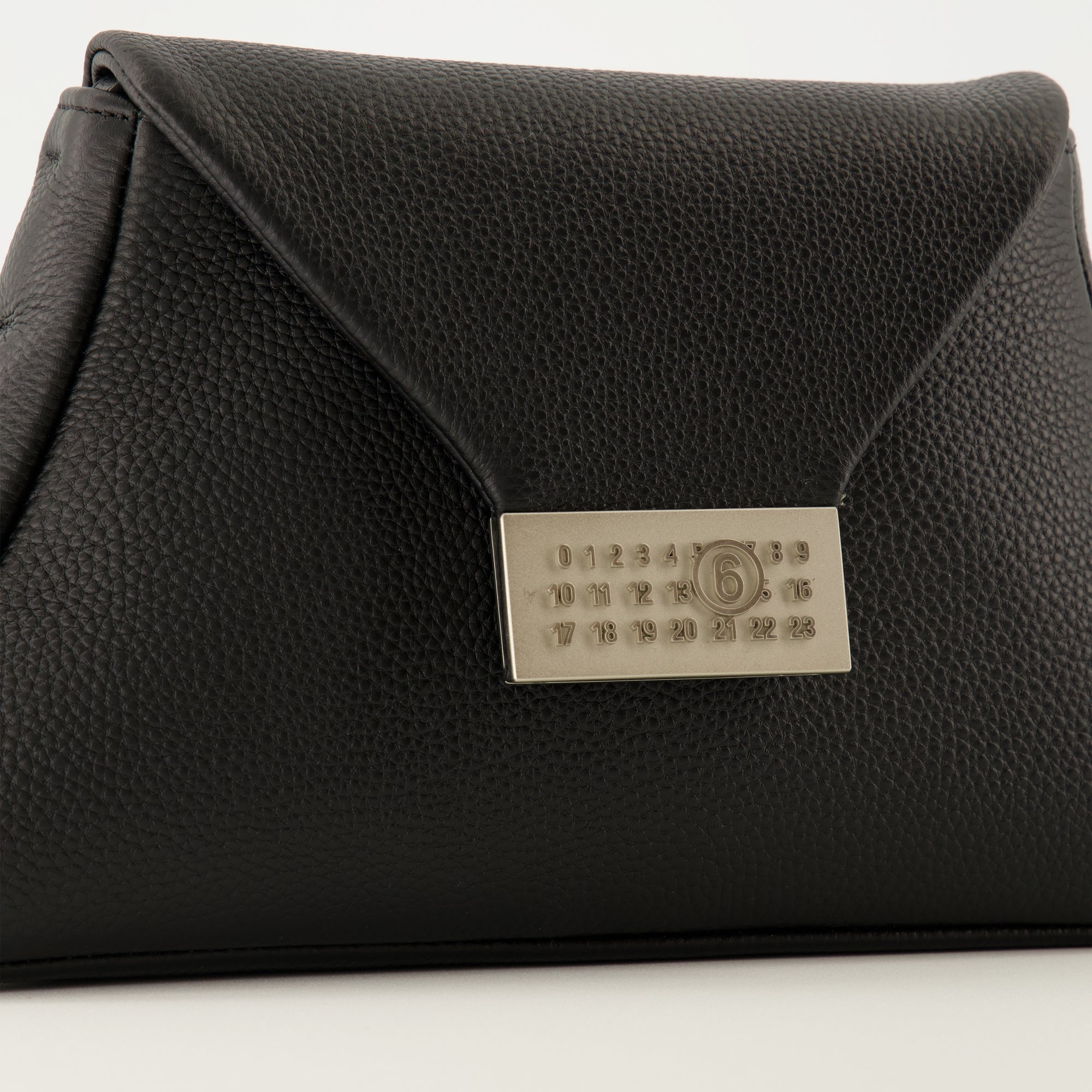 black leather handbag, Numeric Pouch, stylish accessory, designer leather bag, premium handbag