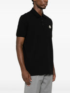 Image of Black Piqué Cotton Polo by Moncler for Men - Season Autumn-Winter 2025 - Model view 2
