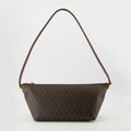 Image du sac en monogramme marron de Saint Laurent pour hommes - Saison printemps-été 2026 - Vue de face