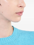 Image of Blue Short Sleeve Sweater by Prada for Women - Season Autumn-Winter 2024 - Model view 4