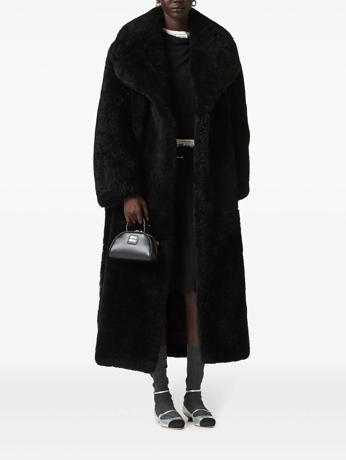Image of Black Ribbed Jersey T-Shirt by Miu Miu for Women - Season Autumn-Winter 2026 - Model View 1