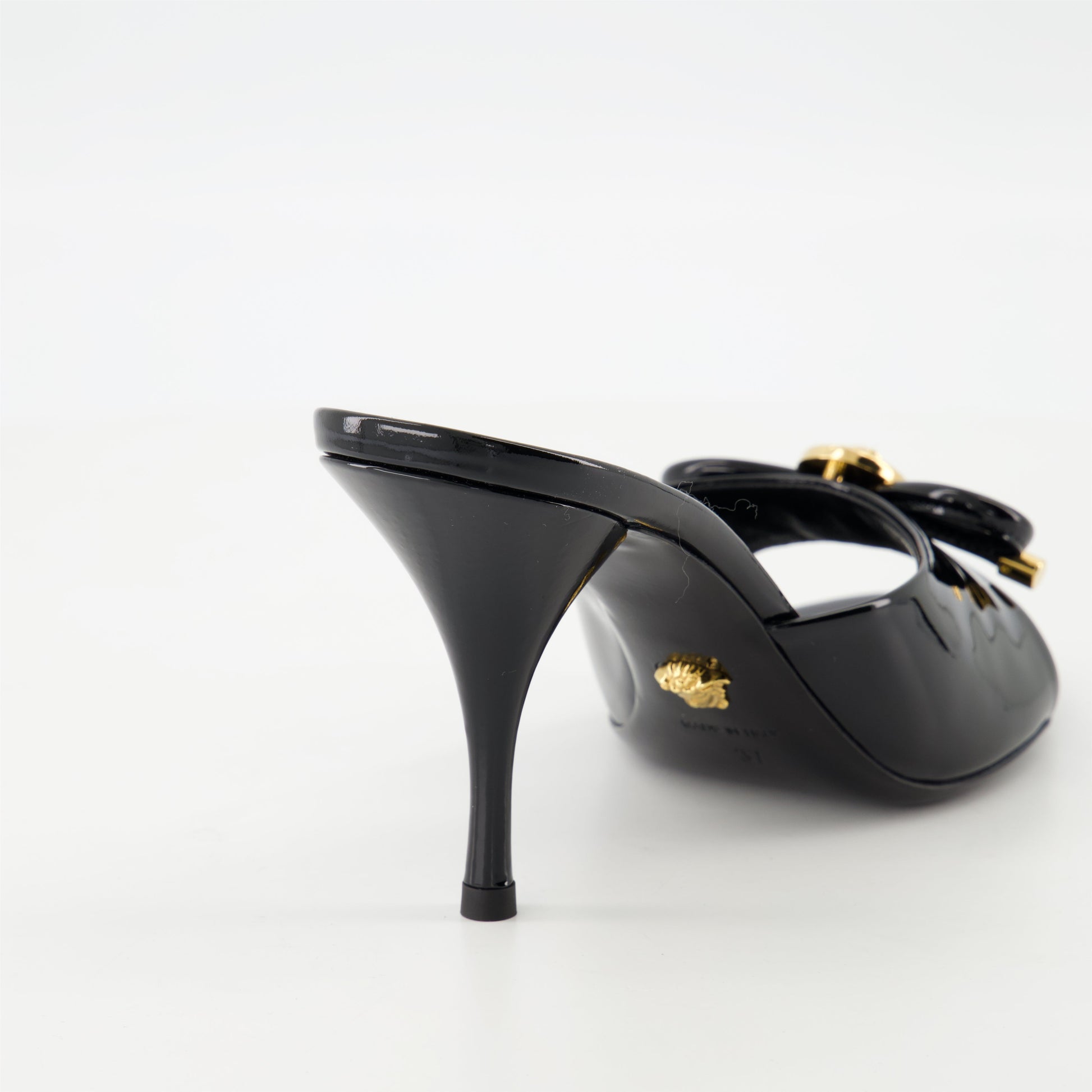 patent leather mules, bow design shoes, Medusa finish footwear, open toe heels, stiletto mules