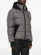 Image of Quilted Gray Jacket with Logo Patch by Moncler Grenoble for Men - Season Autumn-Winter 2024 - Detail View 1