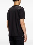 Image of Black T-Adjust-Slits-R17 Tee by Diesel for Men - Season Spring-Summer 2025 - Model view 3
