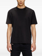 Image of Black T-Adjust-Slits-R17 Tee by Diesel for Men - Season Spring-Summer 2025 - Model view 2