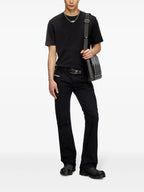 Image of Black T-Adjust-Slits-R17 Tee by Diesel for Men - Season Spring-Summer 2025 - Model view 1