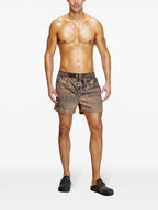 Image of Ken-37 Wash Swim Shorts by Diesel for Men - Season Spring-Summer 2025 - Model view 1