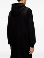 ディーゼルのブラックS-ウマー-ビッグオーバルフーディーの画像（ユニセックス） - シーズン春夏2025 - モデルビュー2