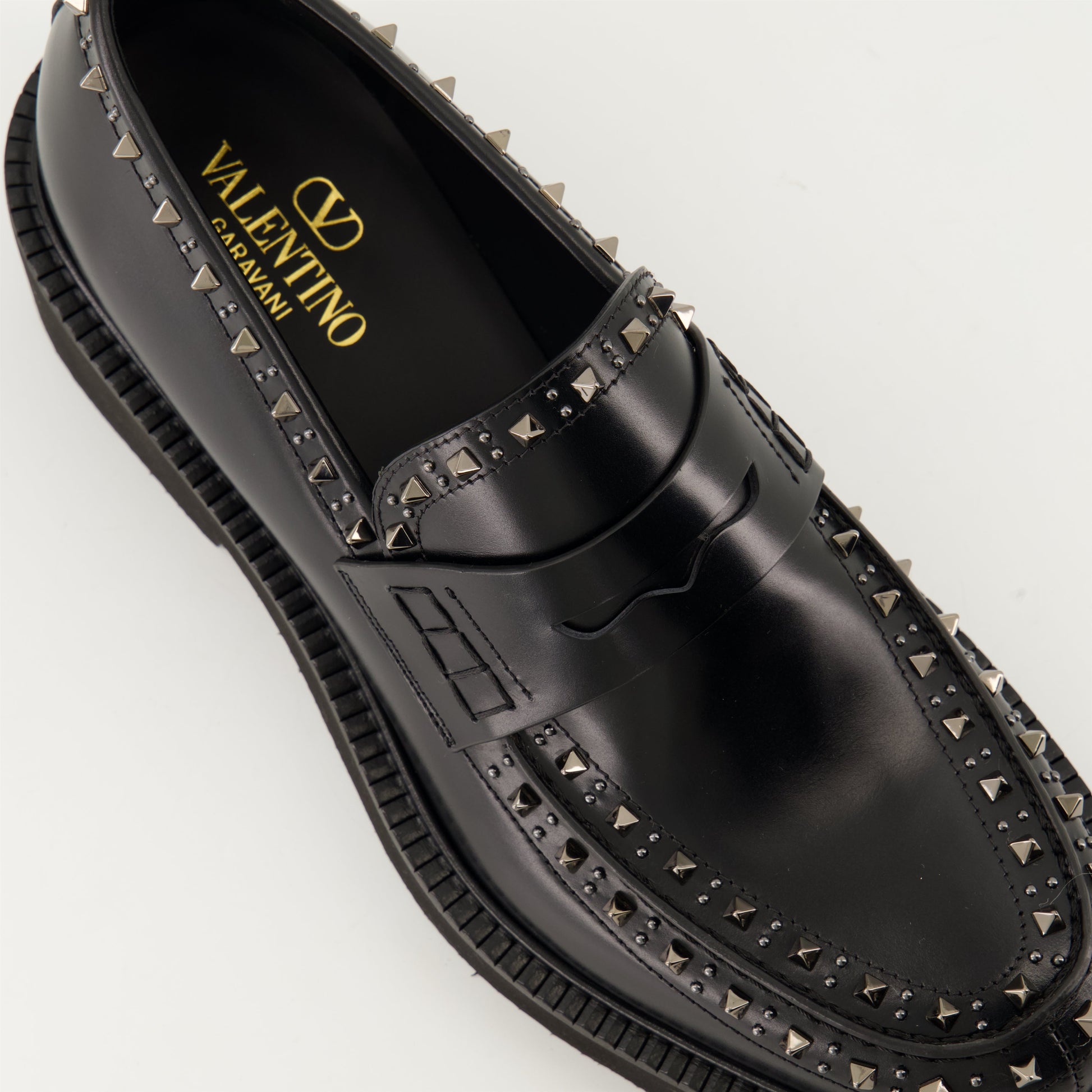 black leather moccasins, round toe, leather sole, refined footwear, classic black moccasins