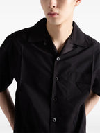 black short sleeve shirt, oversize fit, triangle logo, cotton nylon blend, Prada Spring-Summer 2025