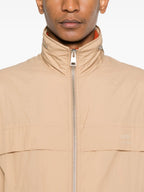 Image of Beige Windbreaker by Ami PARIS for Unisex - Season Autumn-Winter 2024 - Detail View 7