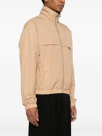 Image of Beige Windbreaker by Ami PARIS for Unisex - Season Autumn-Winter 2024 - Detail View 1