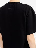 Image of Printed Black T-Shirt Dress by Mm6 for Women - Season Spring-Summer 2025 - Model view 6