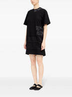 Image of Printed Black T-Shirt Dress by Mm6 for Women - Season Spring-Summer 2025 - Model view 4