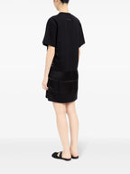Image of Printed Black T-Shirt Dress by Mm6 for Women - Season Spring-Summer 2025 - Model view 5
