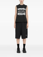 Image of MM6 x Salomon T-Shirt Black by Mm6 for Women - Season Spring-Summer 2025 - Model view 1