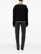 Image of Black and White Knit Sweater by Mm6 for Women - Season Spring-Summer 2025 - Model view 3