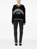 Image of Black and White Knit Sweater by Mm6 for Women - Season Spring-Summer 2025 - Model view 1