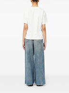 Image of Numeric White T-shirt by Mm6 for Women - Season Spring-Summer 2025 - Model view 3
