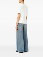 Image of Numeric White T-shirt by Mm6 for Women - Season Spring-Summer 2025 - Model view 4