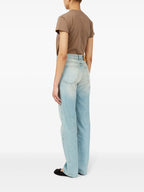 Image of Denim Patchwork Jeans by Mm6 for Women - Season Spring-Summer 2025 - Model view 4