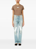 Image of Denim Patchwork Jeans by Mm6 for Women - Season Spring-Summer 2025 - Model view 1