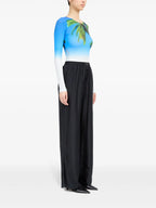 Image of Black Silk Pants with Elastic Waist by Mm6 for Women - Season Spring-Summer 2025 - Model view 2